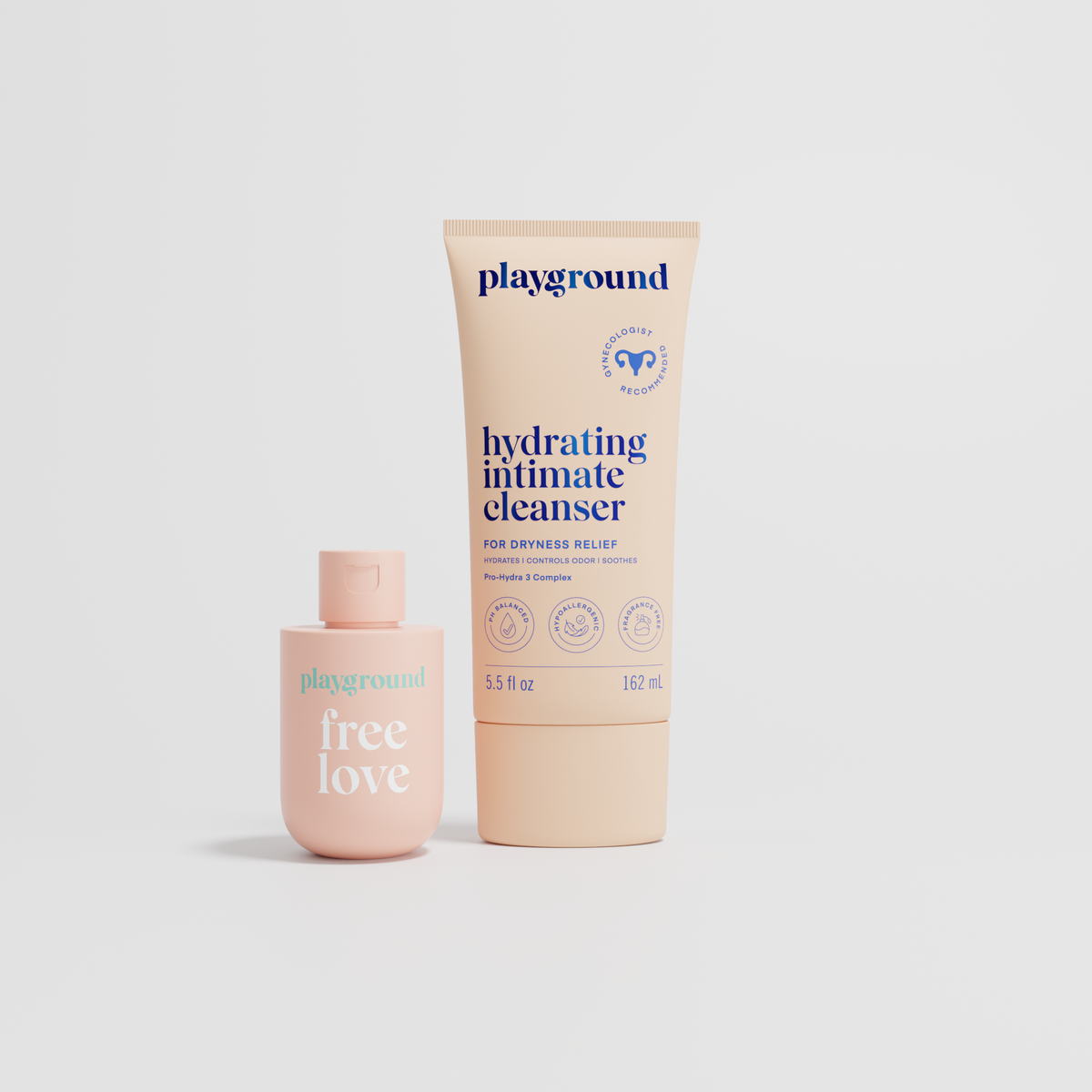 Playground skincare set featuring a tube of Hydrating Intimate Cleanser and a Love Sesh bottle, both in a soft peach-beige color with blue text, on a light gray background.